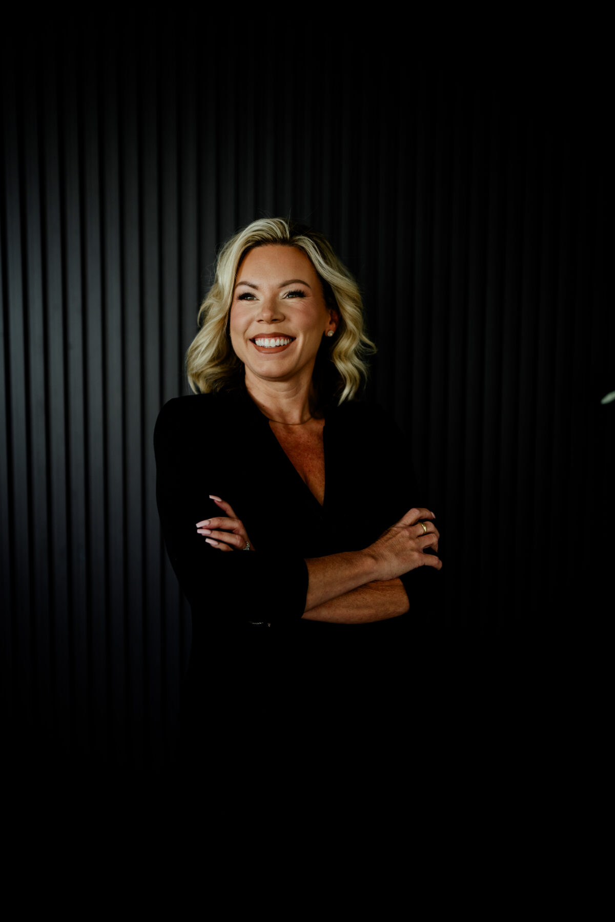Business owner portrait during brand photoshoot, behind-the-scenes content for marketing.